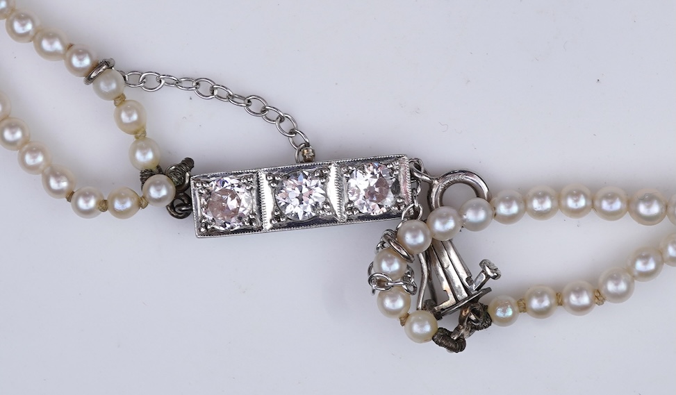 A cultured pearl and diamond necklace, early 20th century